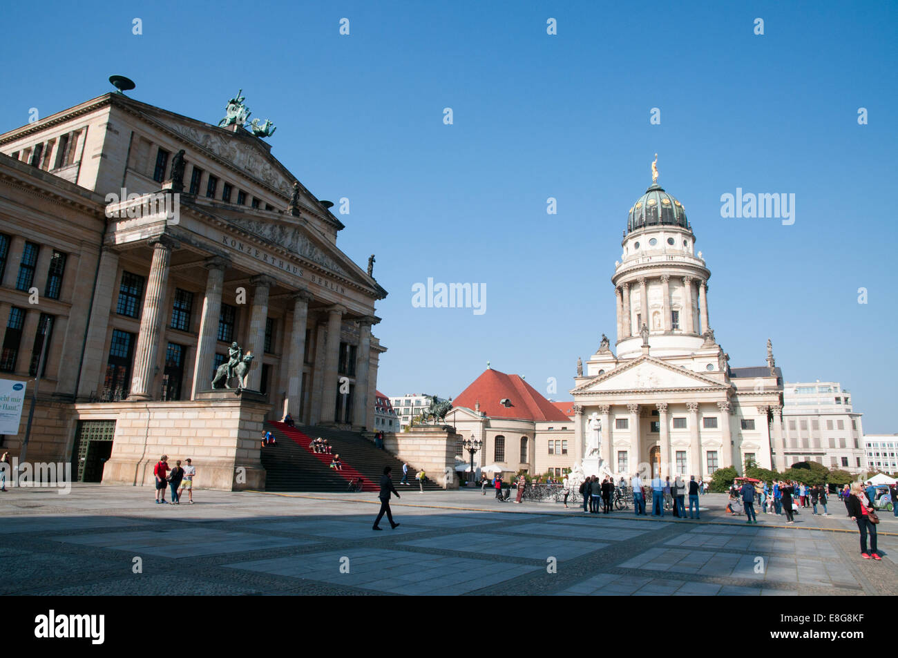 Tourists on Gendarmenmarkt square, Konzerthaus and Franzosischer Dom French Cathedral, Berlin Stock Photo