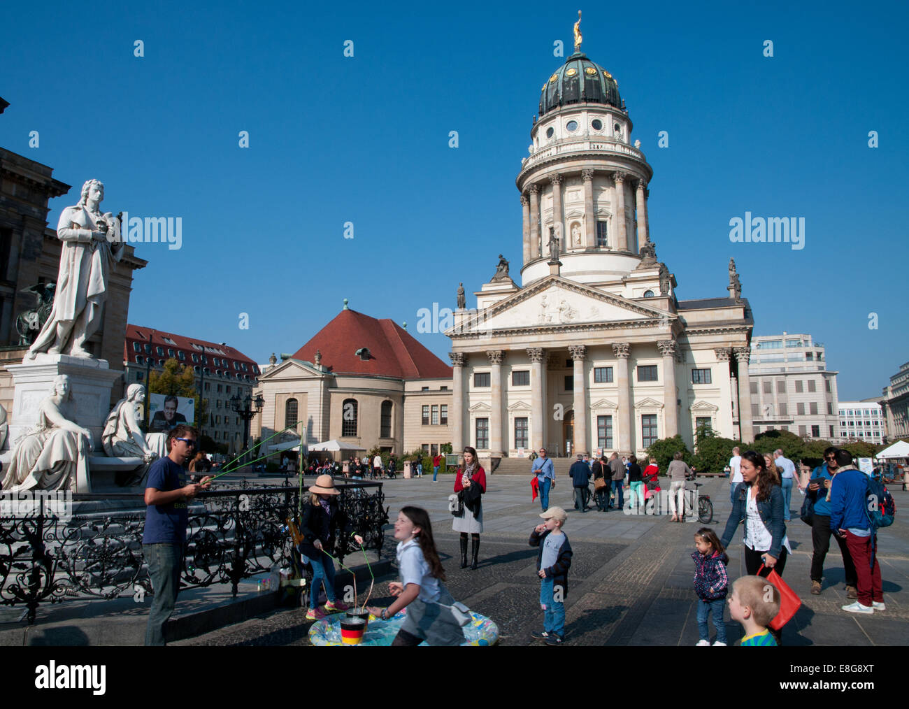 Tourists on Gendarmenmarkt square, Franzosischer Dom French Cathedral, Berlin Stock Photo