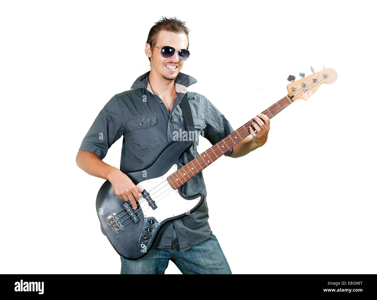 Cool european bass guitar player wearing sun glasses Stock Photo