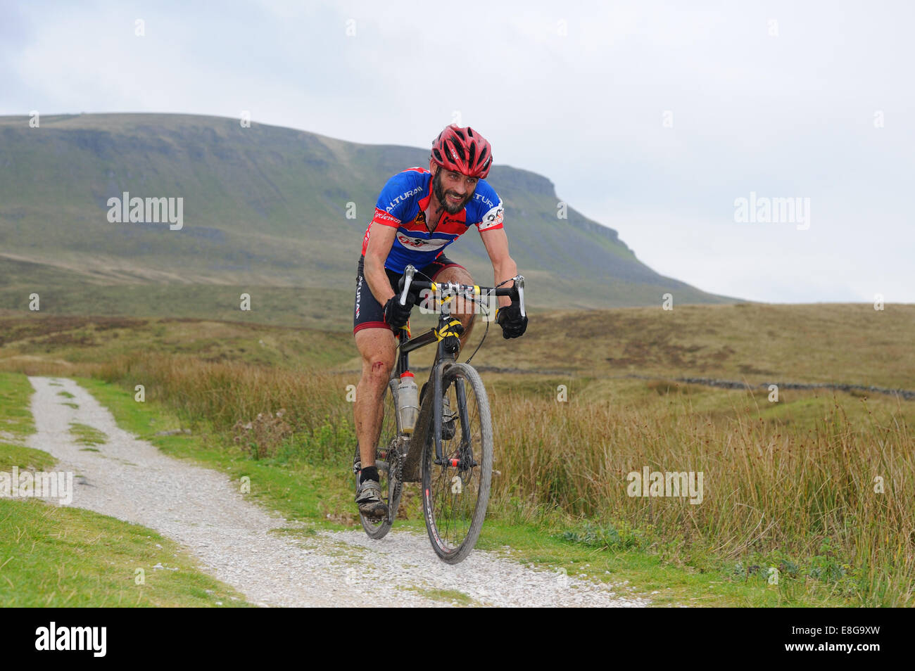 Competitor in the three peaks cx race with Peny Gent in the background Stock Photo