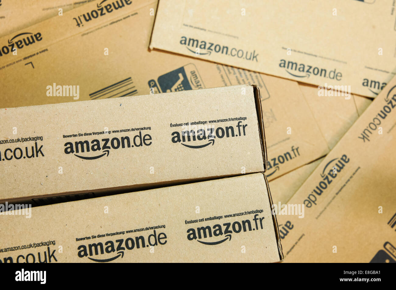 Amazon logo logos on boxes and packages, amazon boxes Stock Photo