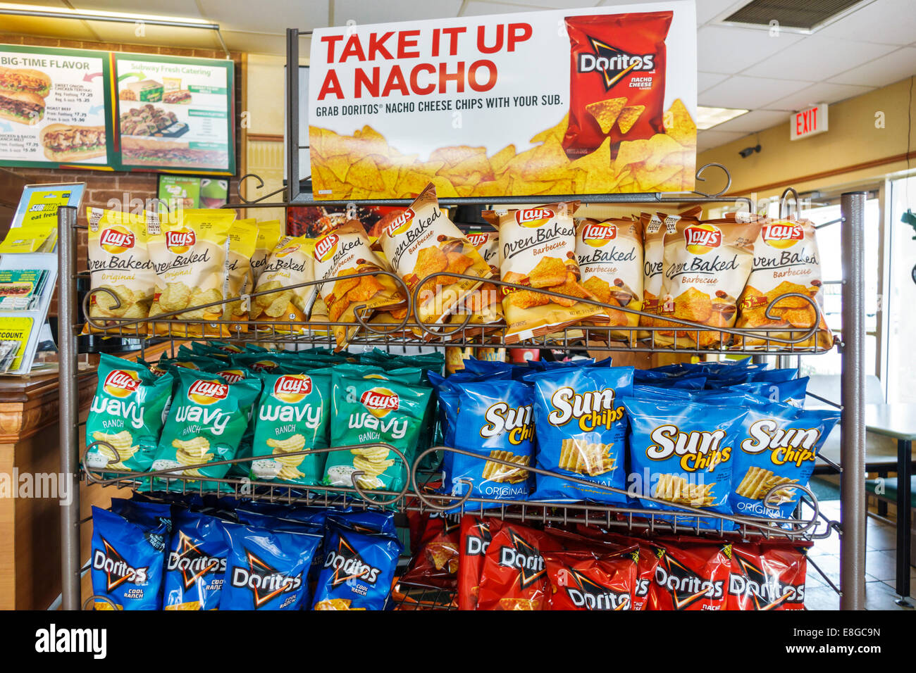 Naples Florida,subway,train,sandwich shop,bags,potato chips,display sale Doritos,Lay's,junk food,nacho,nachos,FL140430008 Stock Photo