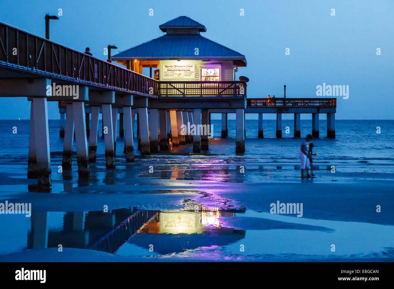Fort Ft. Myers Beach Florida,Gulf of Mexico,beach beaches,sand,Fishing Pier,Rudy's Treasure Chest,night nightlife evening after dark,surf,low tide,vis Stock Photo