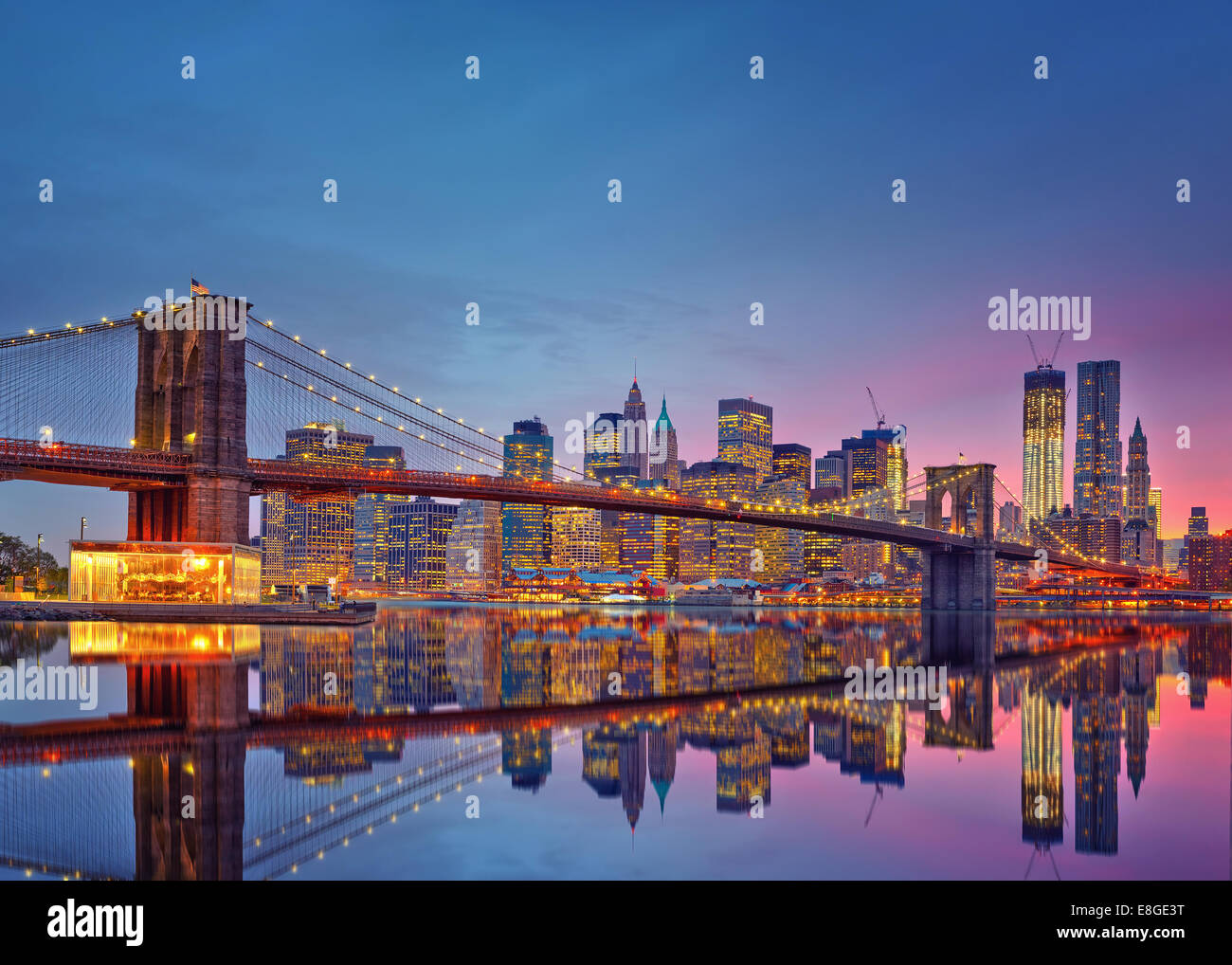 Brooklyn bridge and Manhattan at dusk Stock Photo