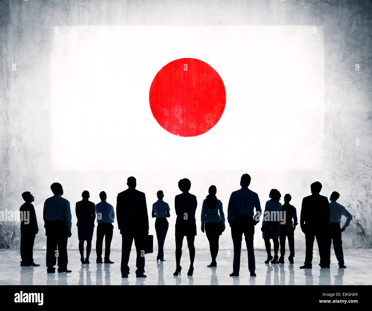Group of business people standing with a view of the national flag of Japan. 