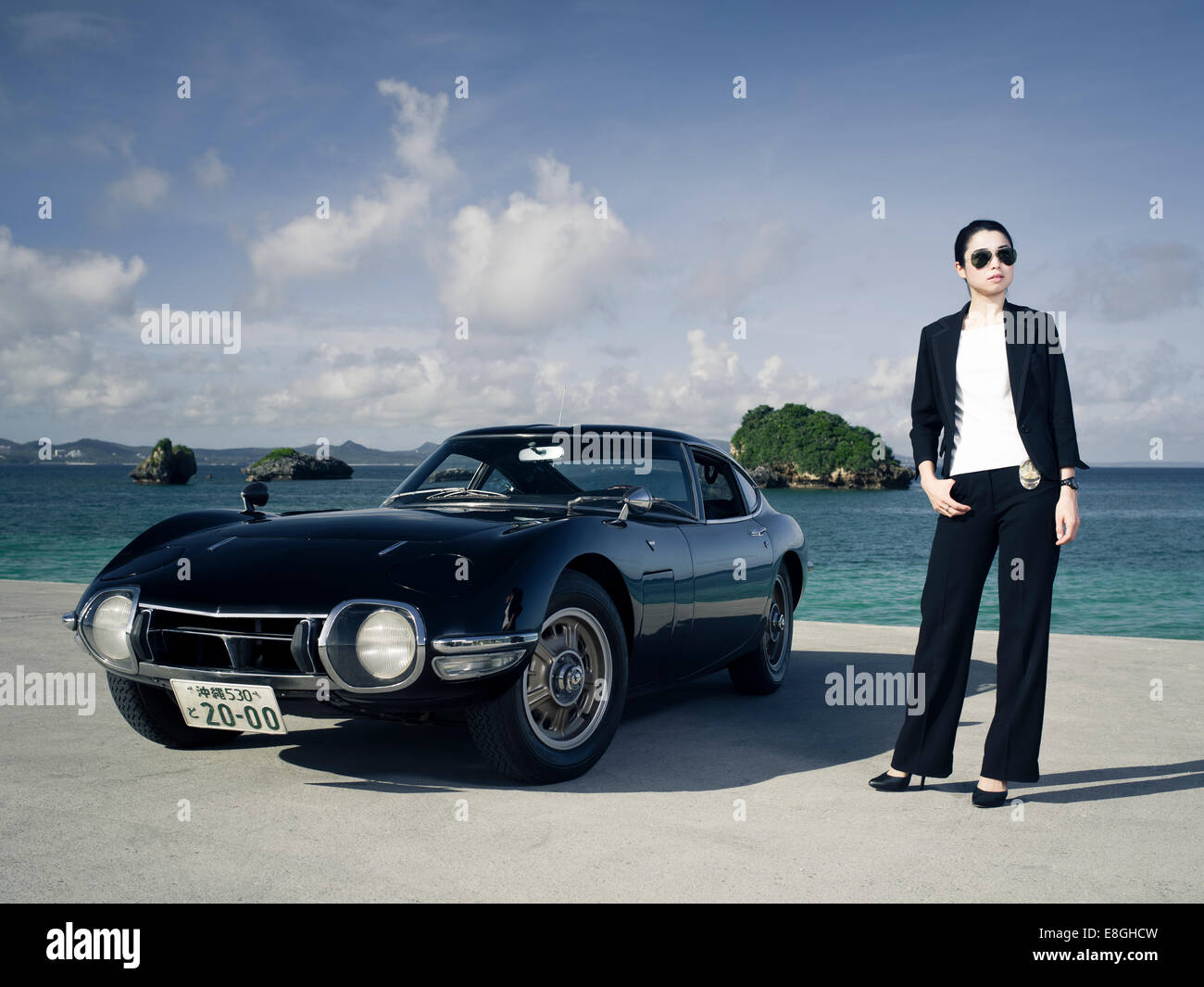 'Detective' with LHD Toyota 2000GT Japanese sports car in Okinawa, Japan. Stock Photo