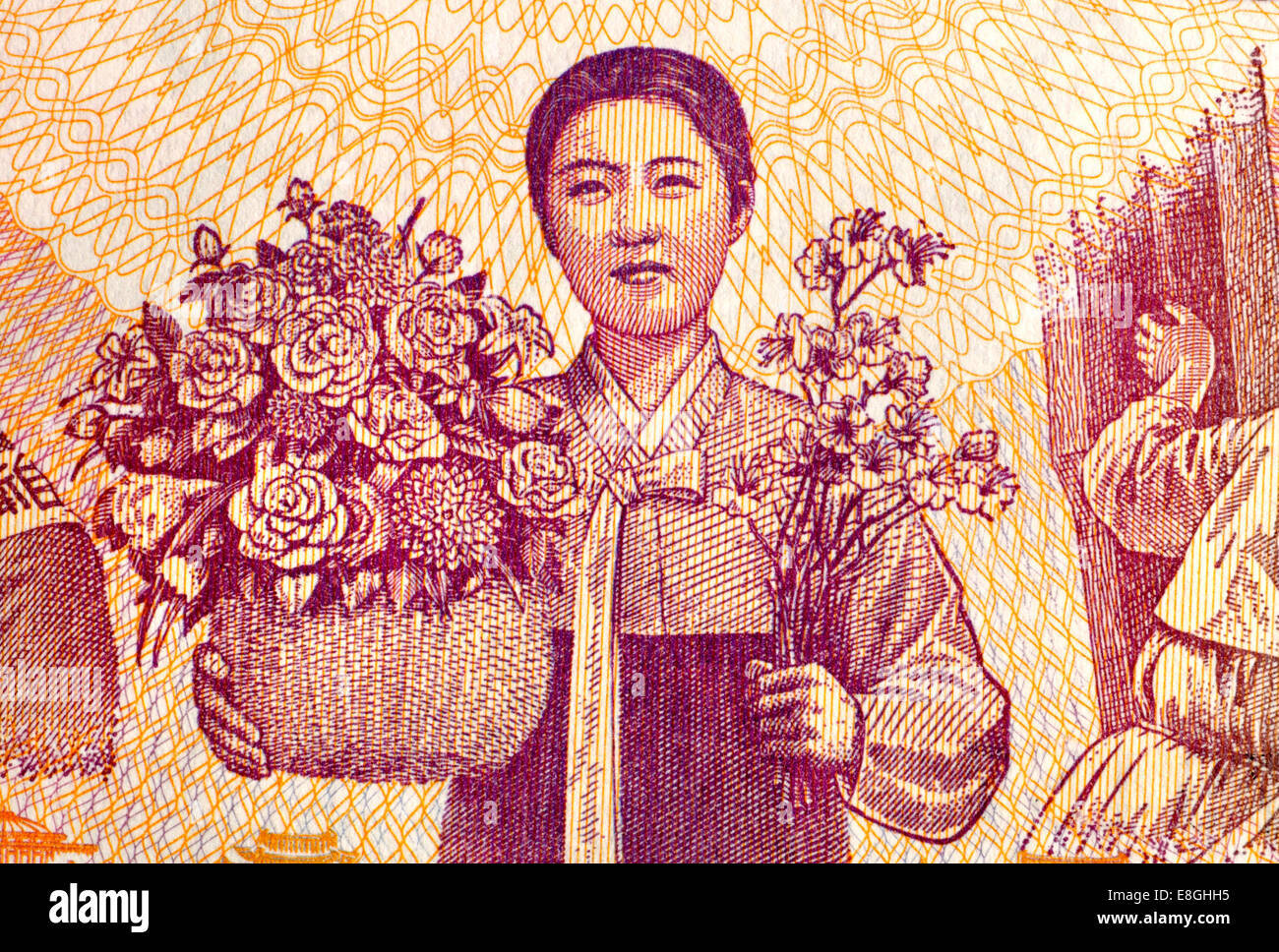 Detail of North Korean one Won banknote (1978) showing a woman holding flowers Stock Photo