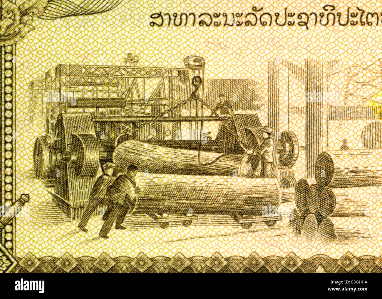 Detail from a Laos 10 Kip banknote showing logging Stock Photo