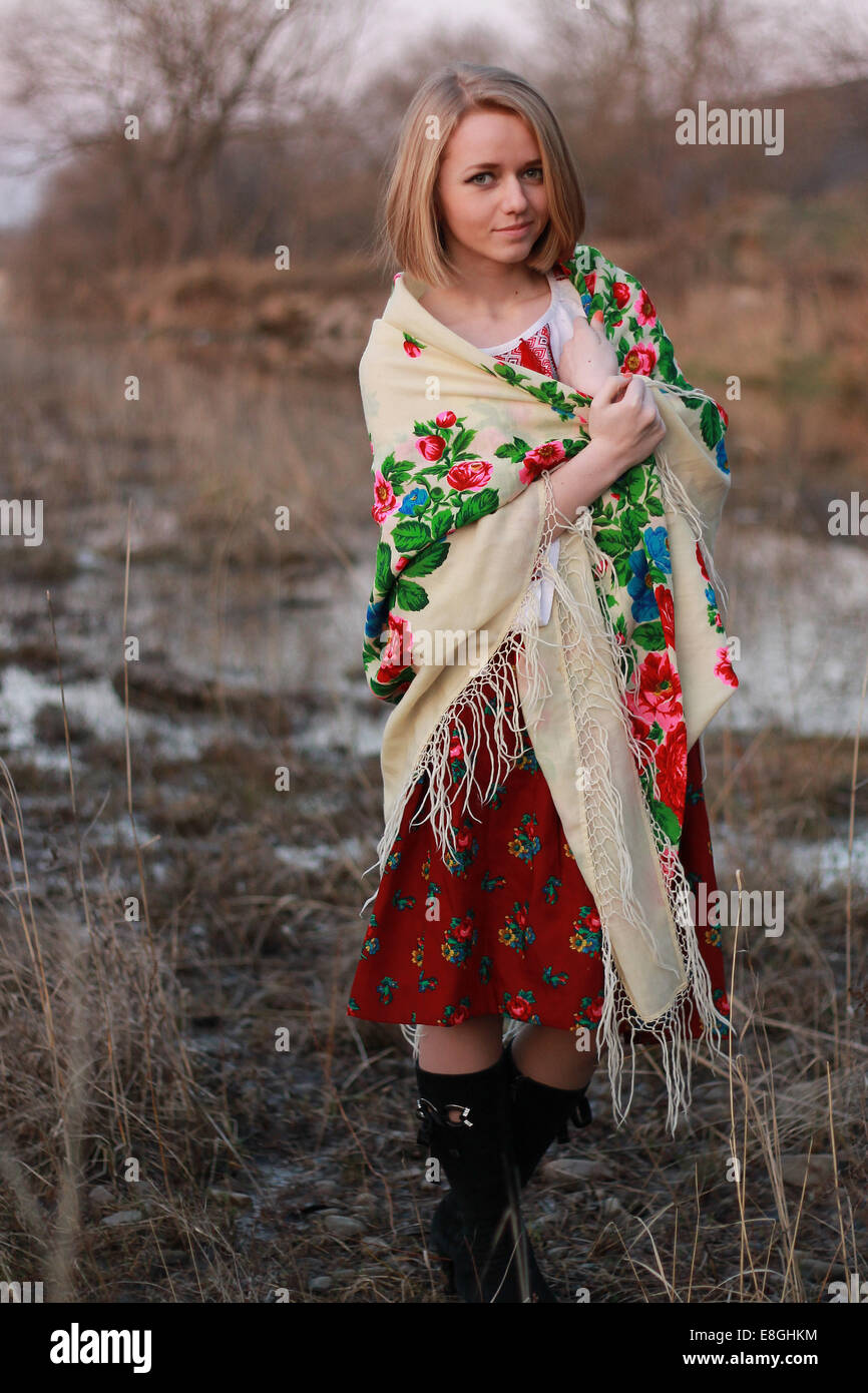 Portrait of young woman wearing traditional shawl Stock Photo