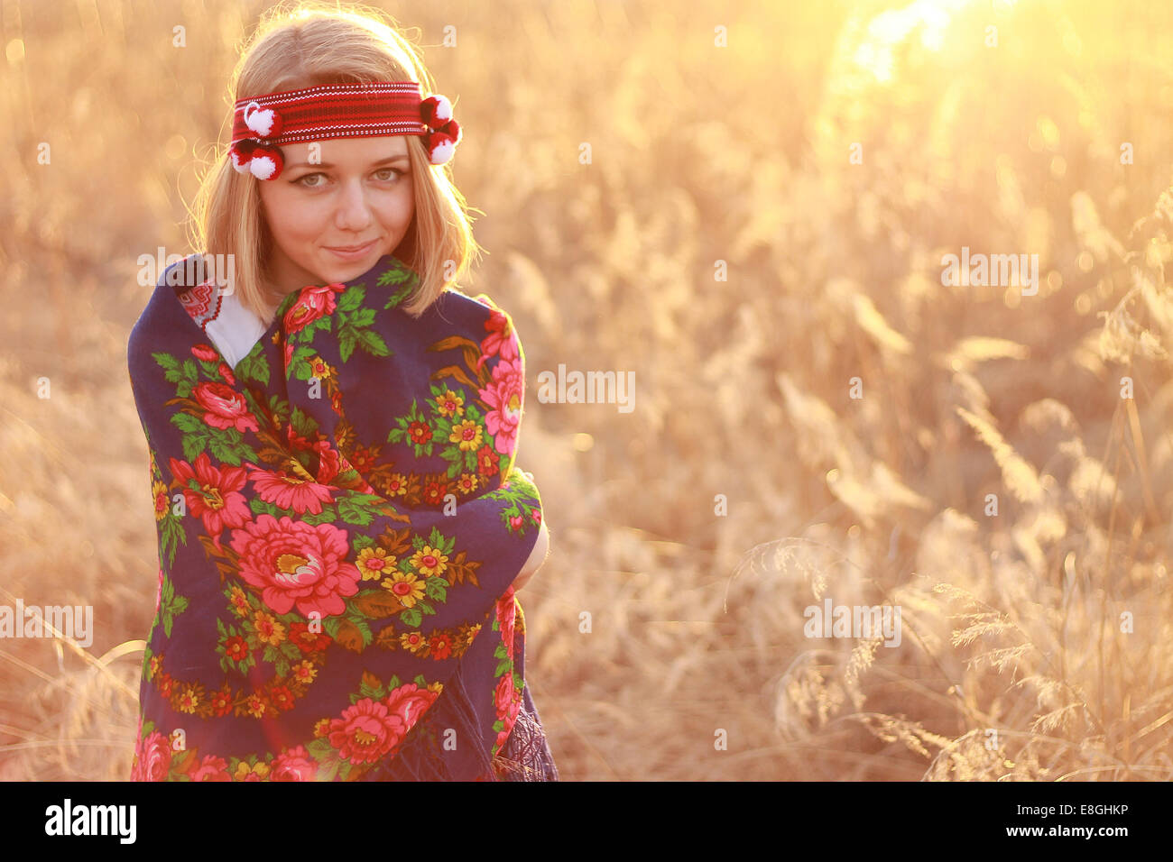 Portrait of young woman wearing traditional shawl Stock Photo