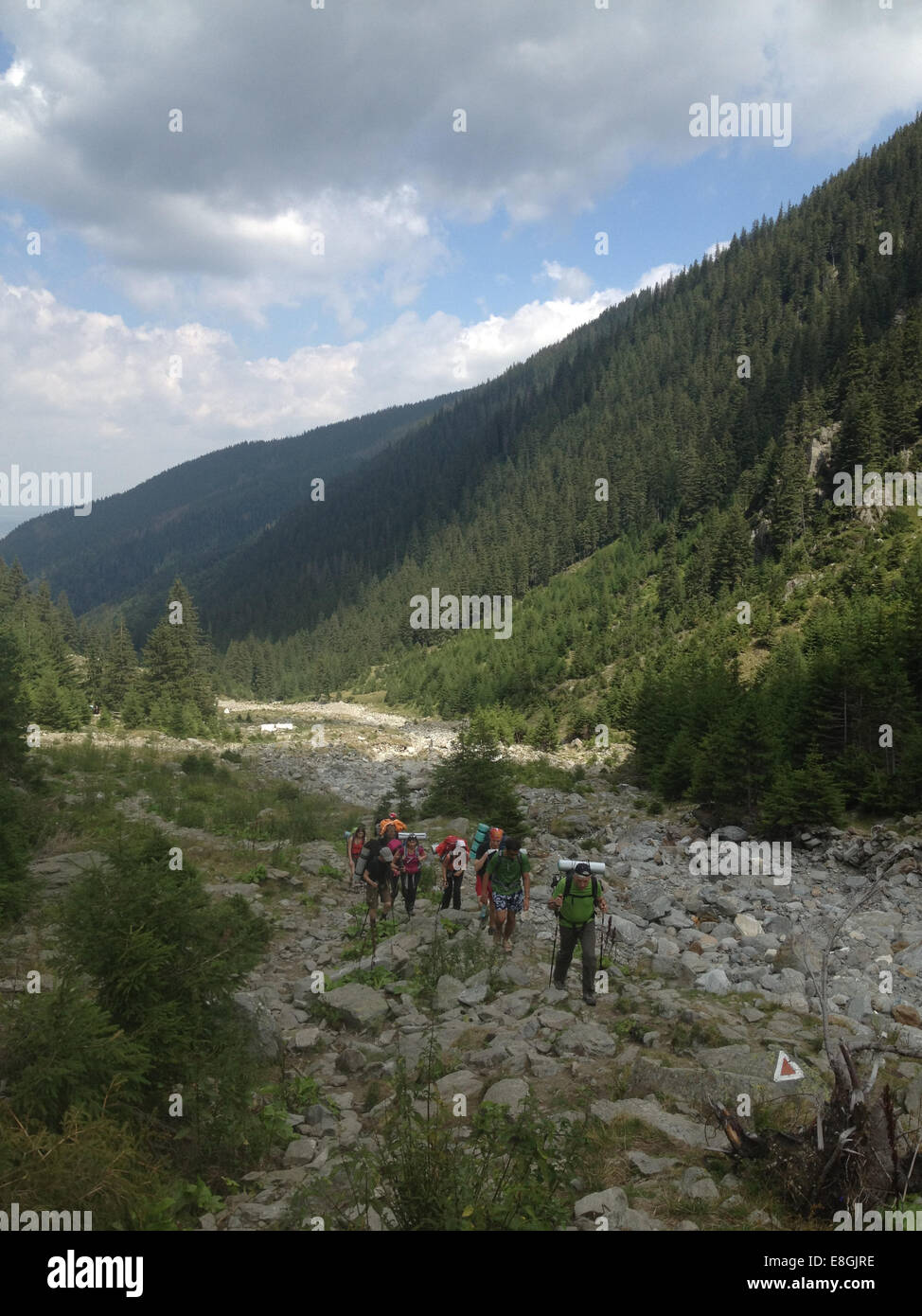 Romania, Fagaras Mountains, Hikers on mountain trail Stock Photo