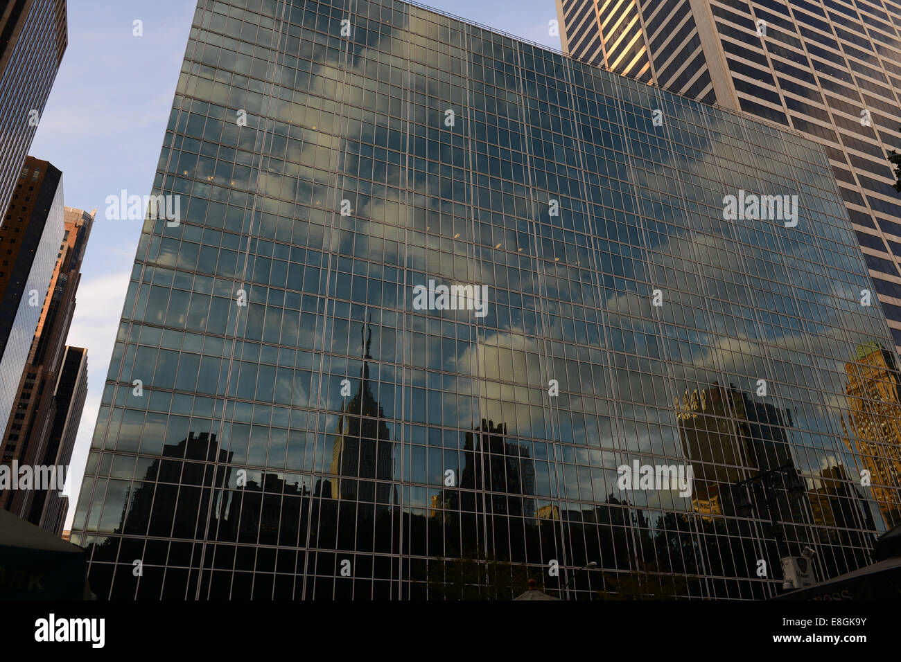 USA, New York State, New York City, Reflection of Empire State Building and skyline in building facade Stock Photo