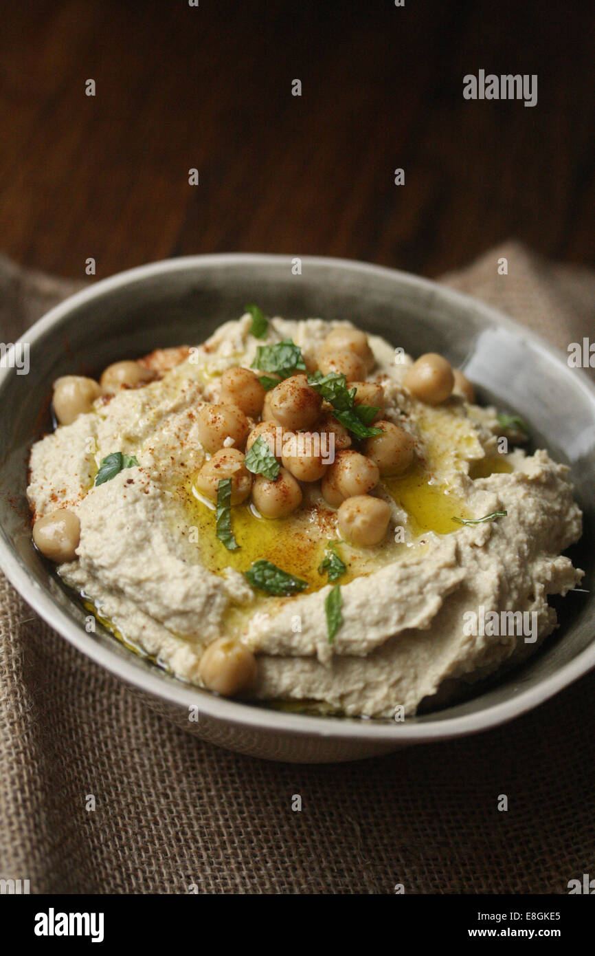 Bowl of Spicy chipotle hummus with chickpeas Stock Photo