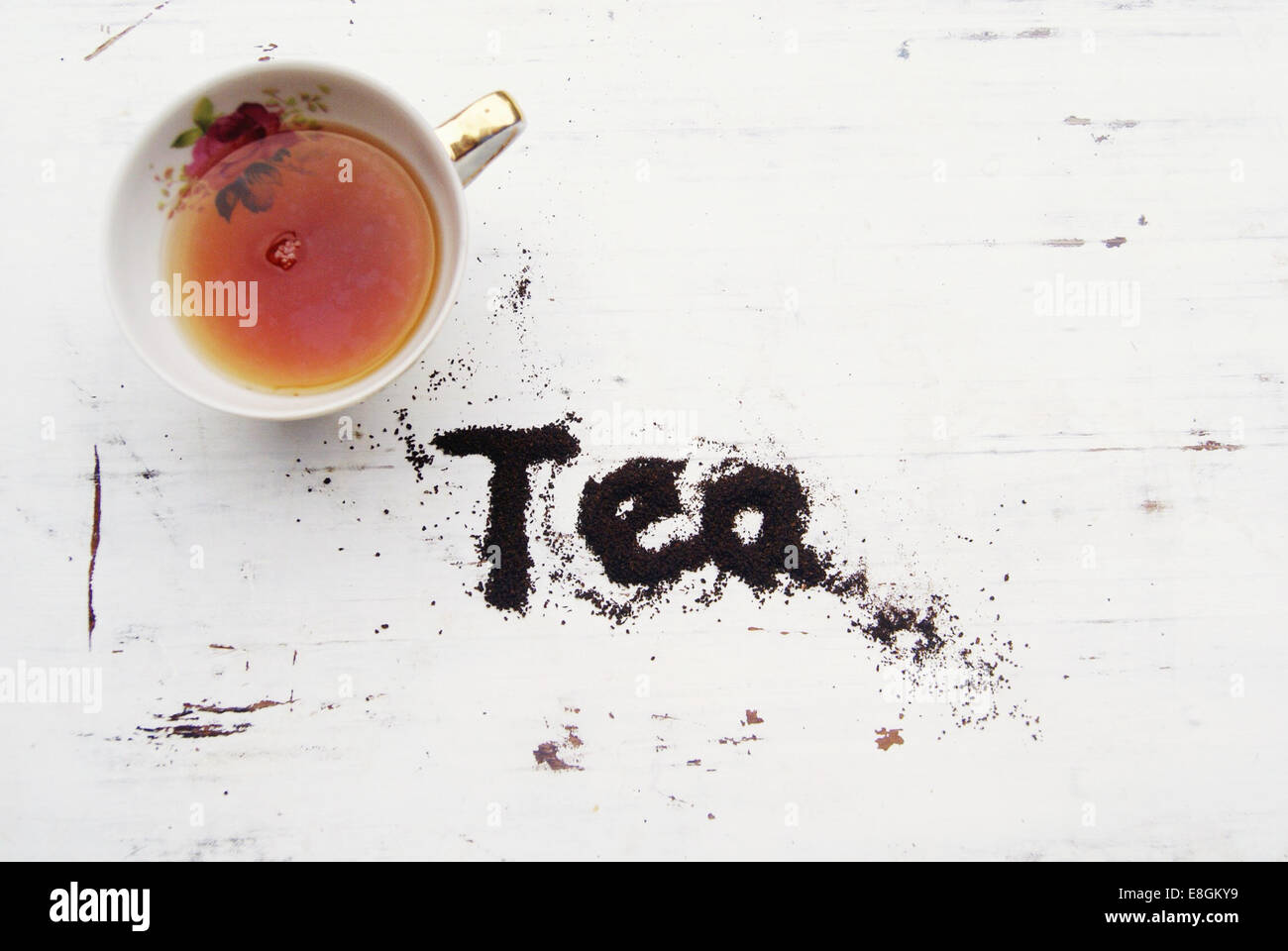 China tea cup with word tea spelled in tea leaves Stock Photo Alamy