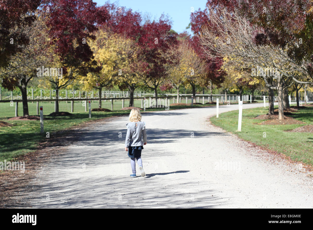 Girl walking road hi-res stock photography and images - Alamy