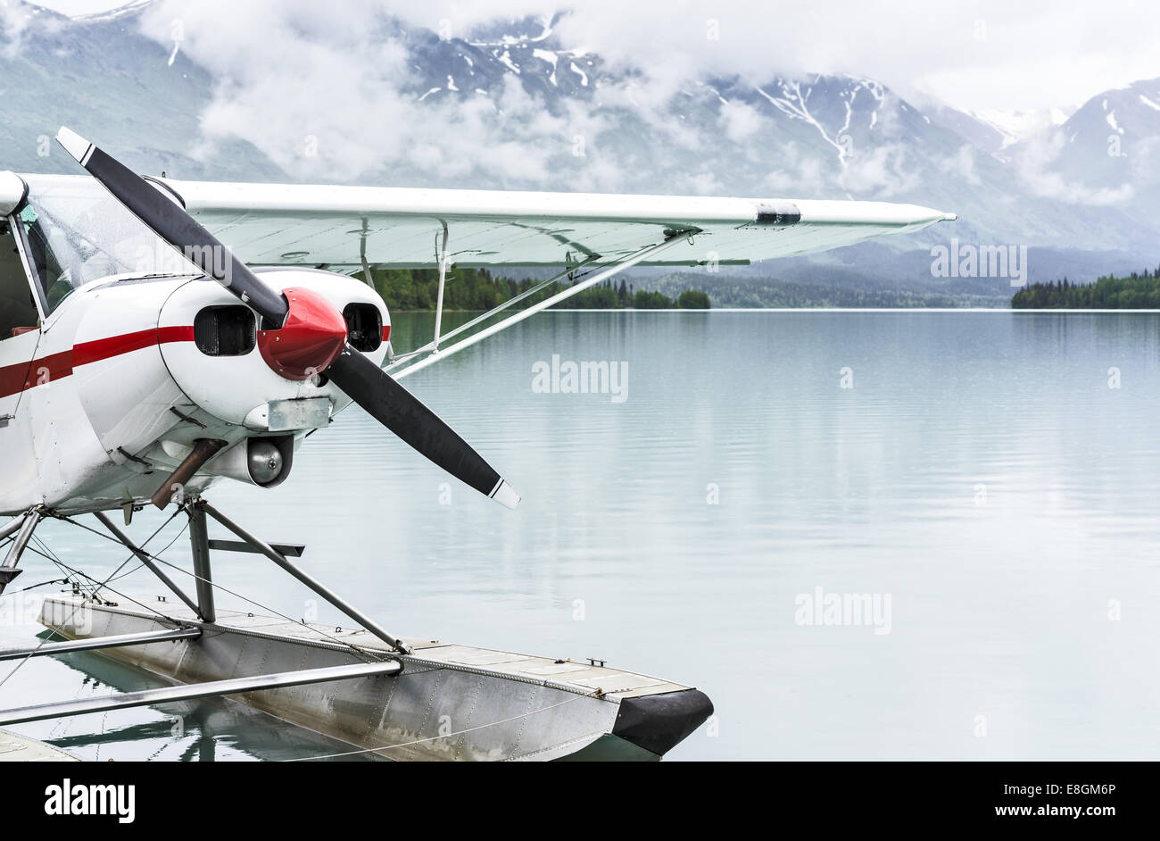 USA, Alaska, Kenai, Moose Pass, Float plane at dock on lake Stock Photo