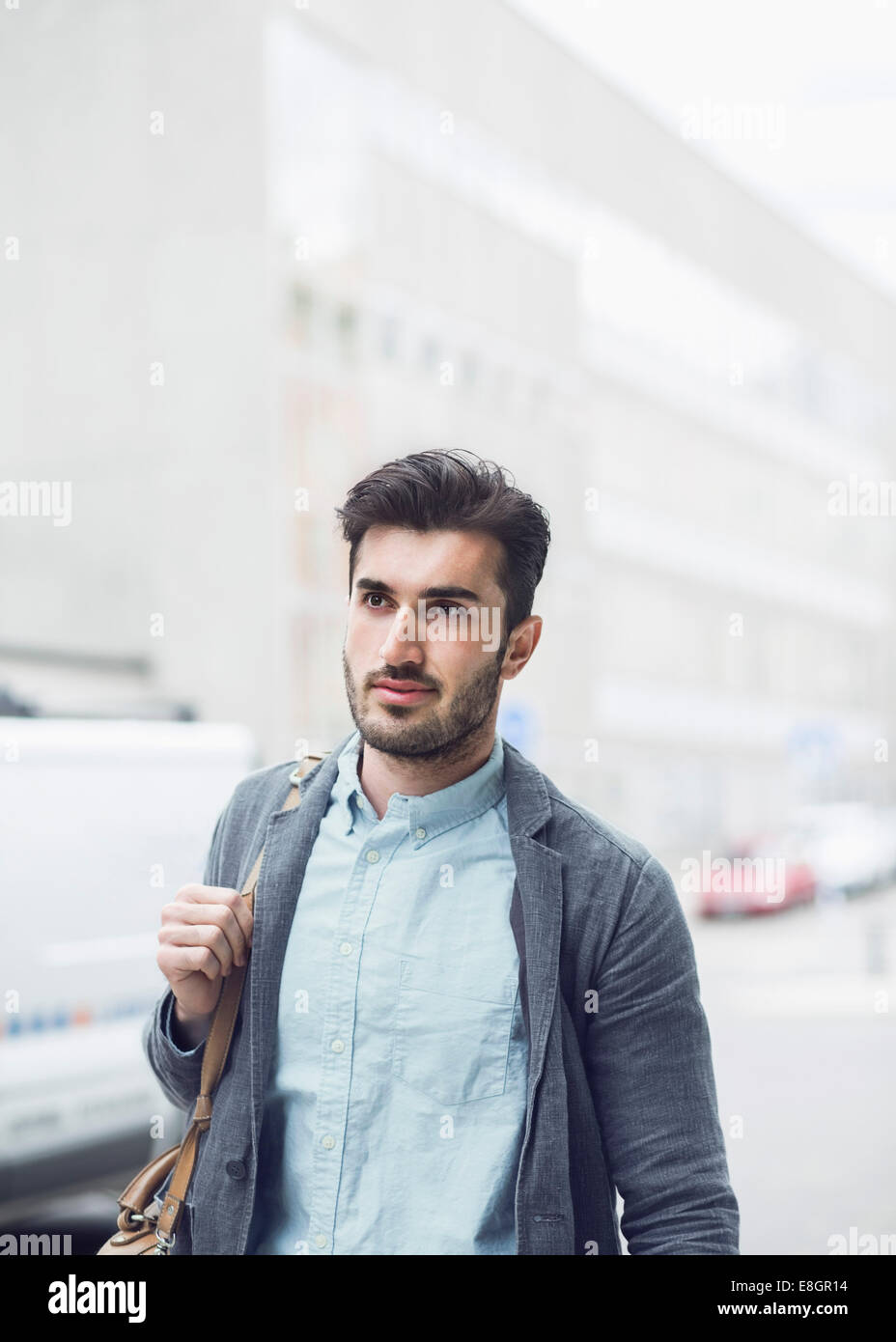Young man walking on white hi-res stock photography and images - Alamy