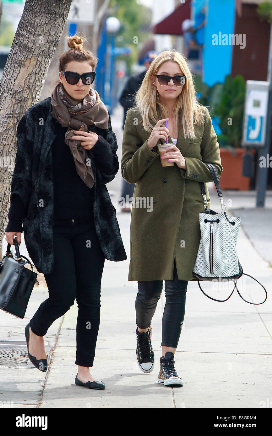 Ashley Benson goes out to lunch with a friend in Beverly Hills carrying an Elizabeth and James Perforated Cynnie Sling  Featuring: Ashley Benson Where: Los Angeles, California, United States When: 05 Apr 2014 Stock Photo