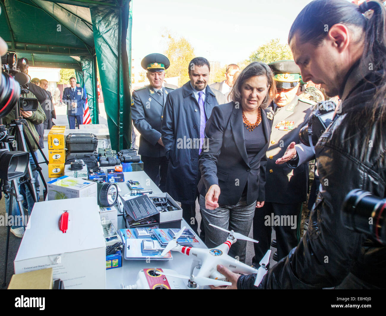 Kiev, Ukraine. 8th October, 2014. Assistant Secretary of State Victoria Nuland examines equipment, passed to Ukrainian border guards. . Official authorized the State Department for European and Eurasian Affairs Victoria Nuland gave the Ukrainian border guards vehicles and equipment for arrangement of the border.  The total amount of assistance is $ 10 million.   Credit:  Igor Golovnov/Alamy Live News Stock Photo