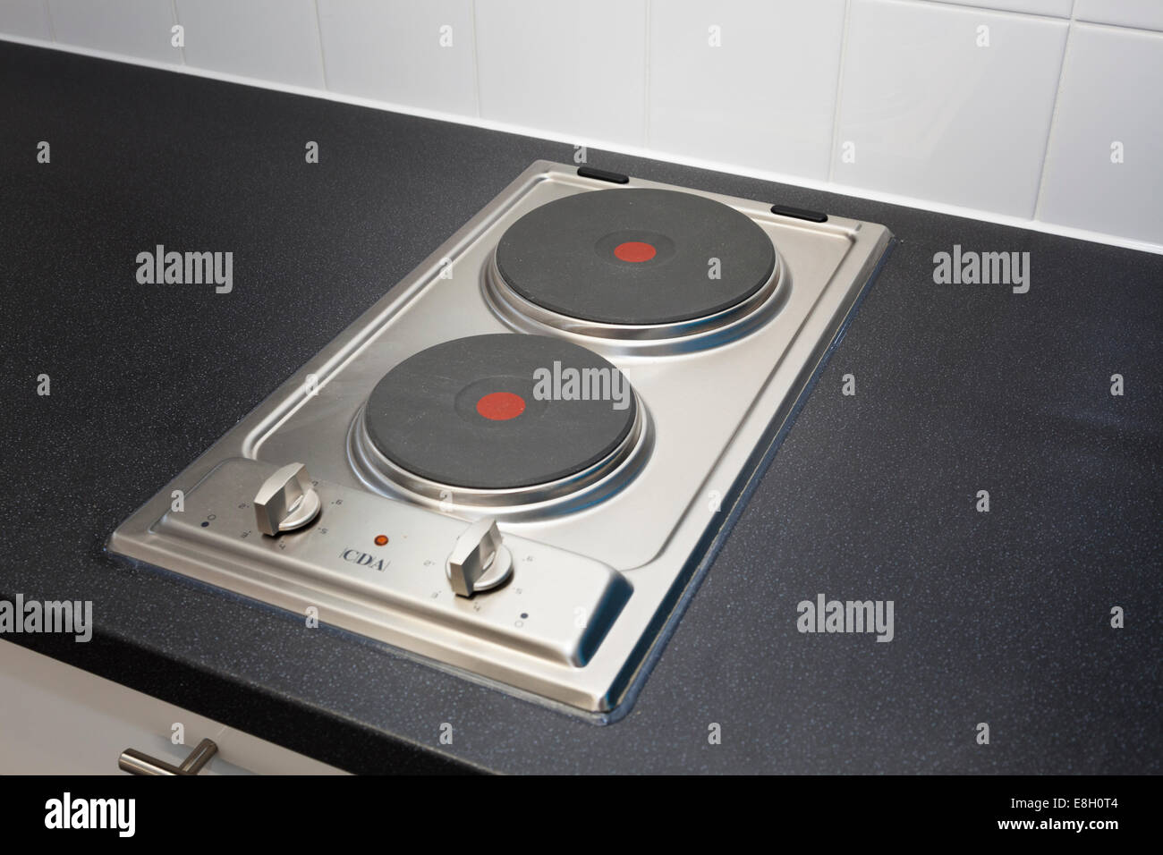 Two element electric hotplate set in worktop. Stock Photo