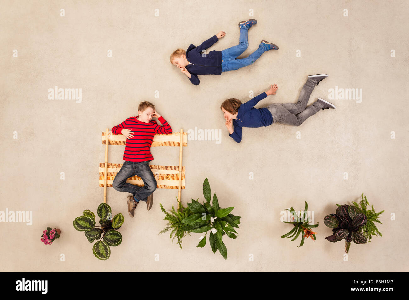 Boy sleeping on park bench hi-res stock photography and images - Alamy