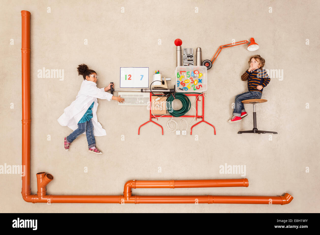 Children creating miraculous learning machine Stock Photo