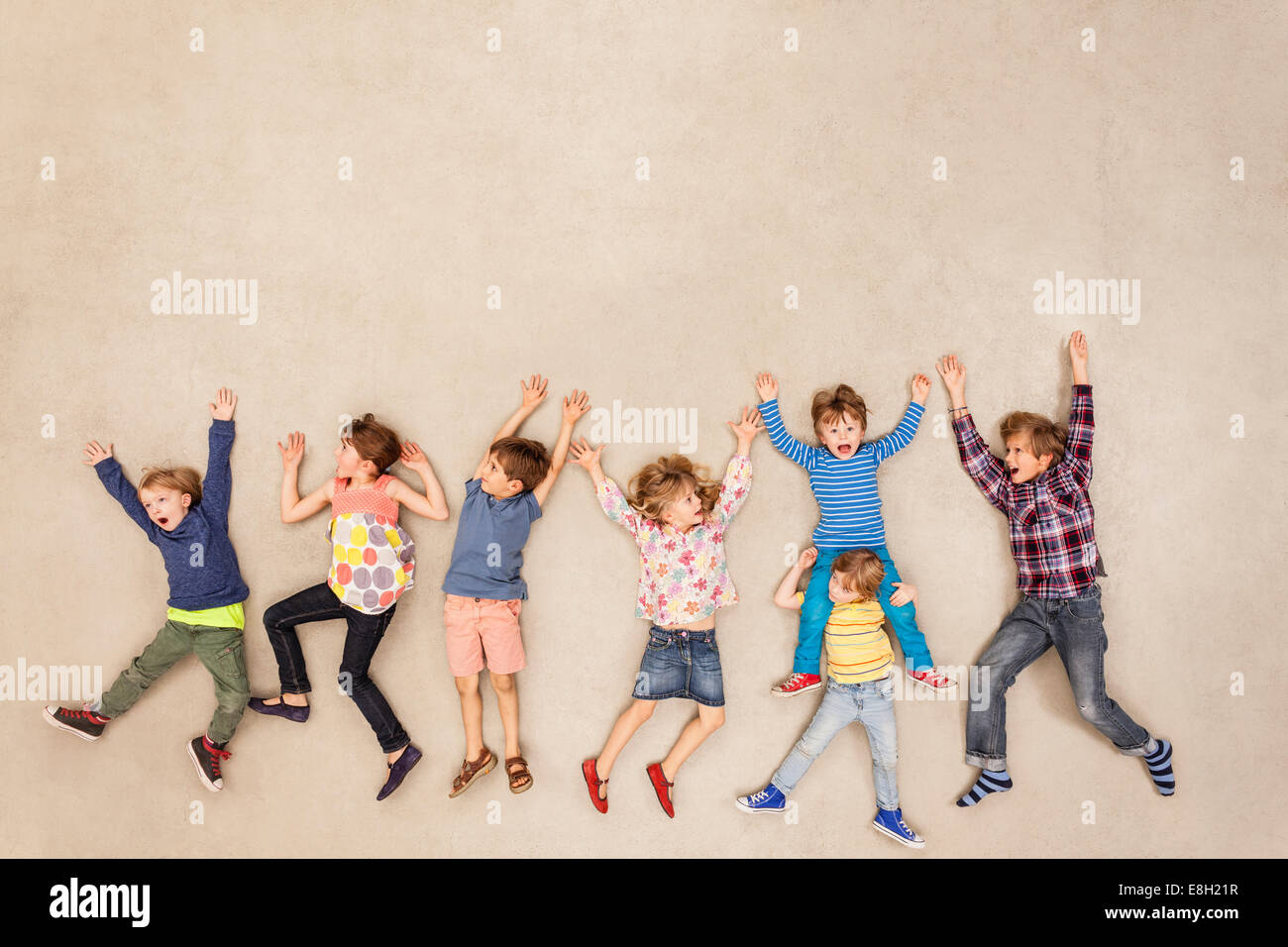 Children messing around happily Stock Photo - Alamy