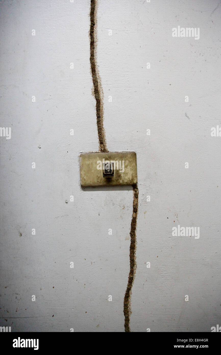 Light switch and crack in wall Stock Photo Alamy