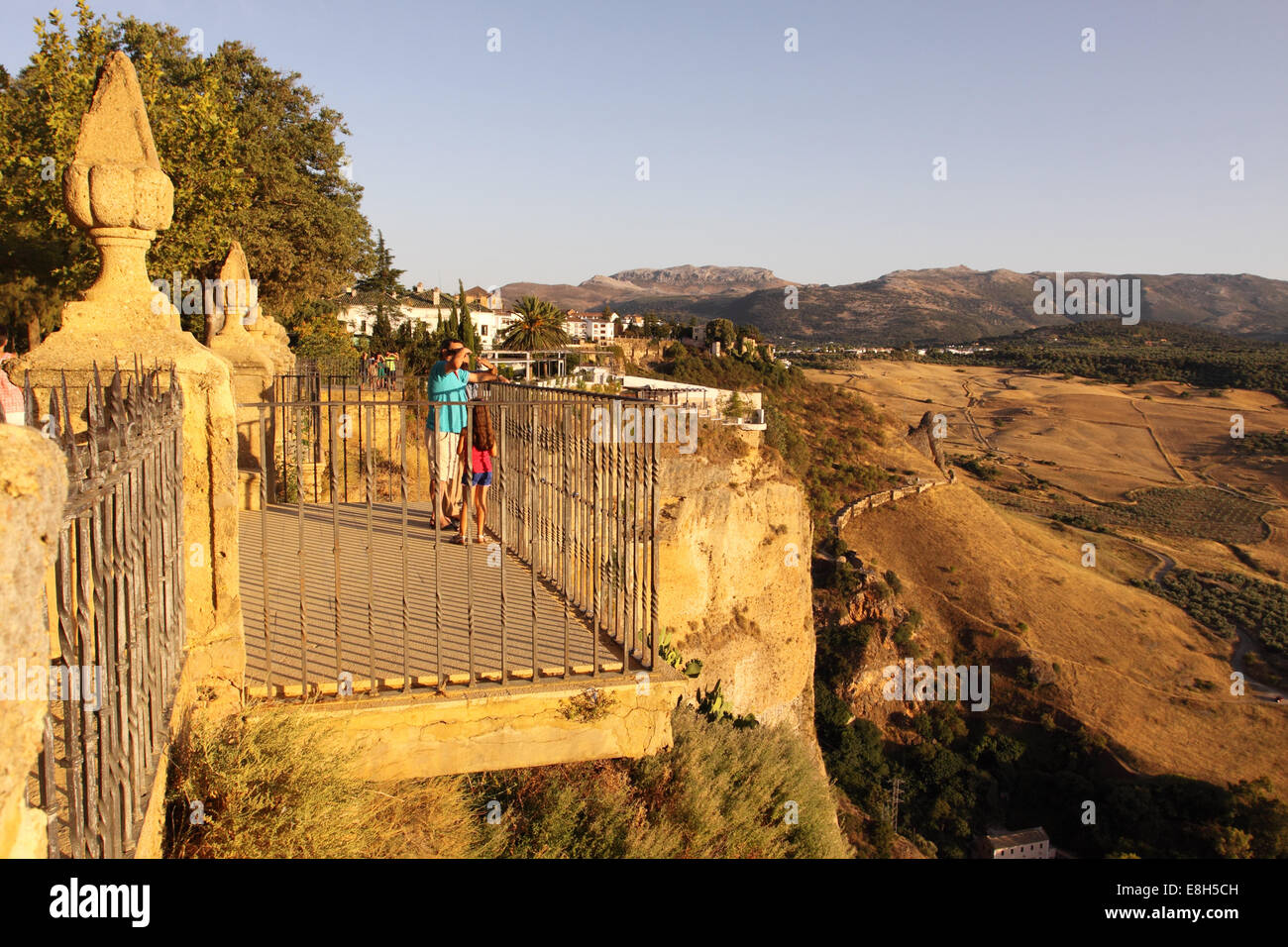 Ronda Spain the town sits on top of tall cliffs giving spectacular views across the nearby Sierra de Grazalema mountains Stock Photo
