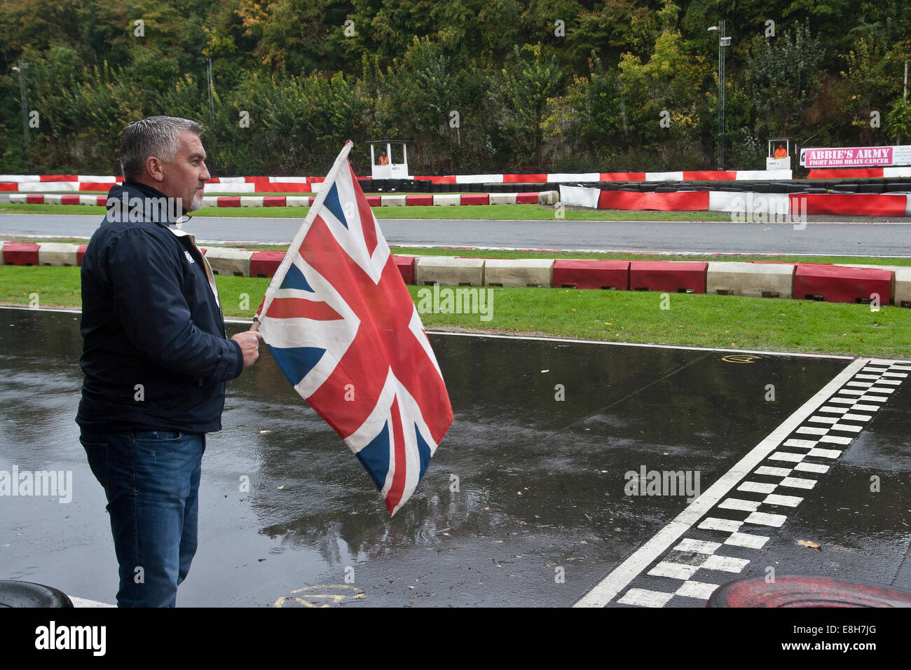 Kent, UK. 8th October, 2014. BBC Television's 'Great British Bake Off' star Paul Hollywood opens this year's Henry Surtees Challenge at Buckmore Park, Kent, United Kingdom. Credit:  theodore liasi/Alamy Live News Stock Photo