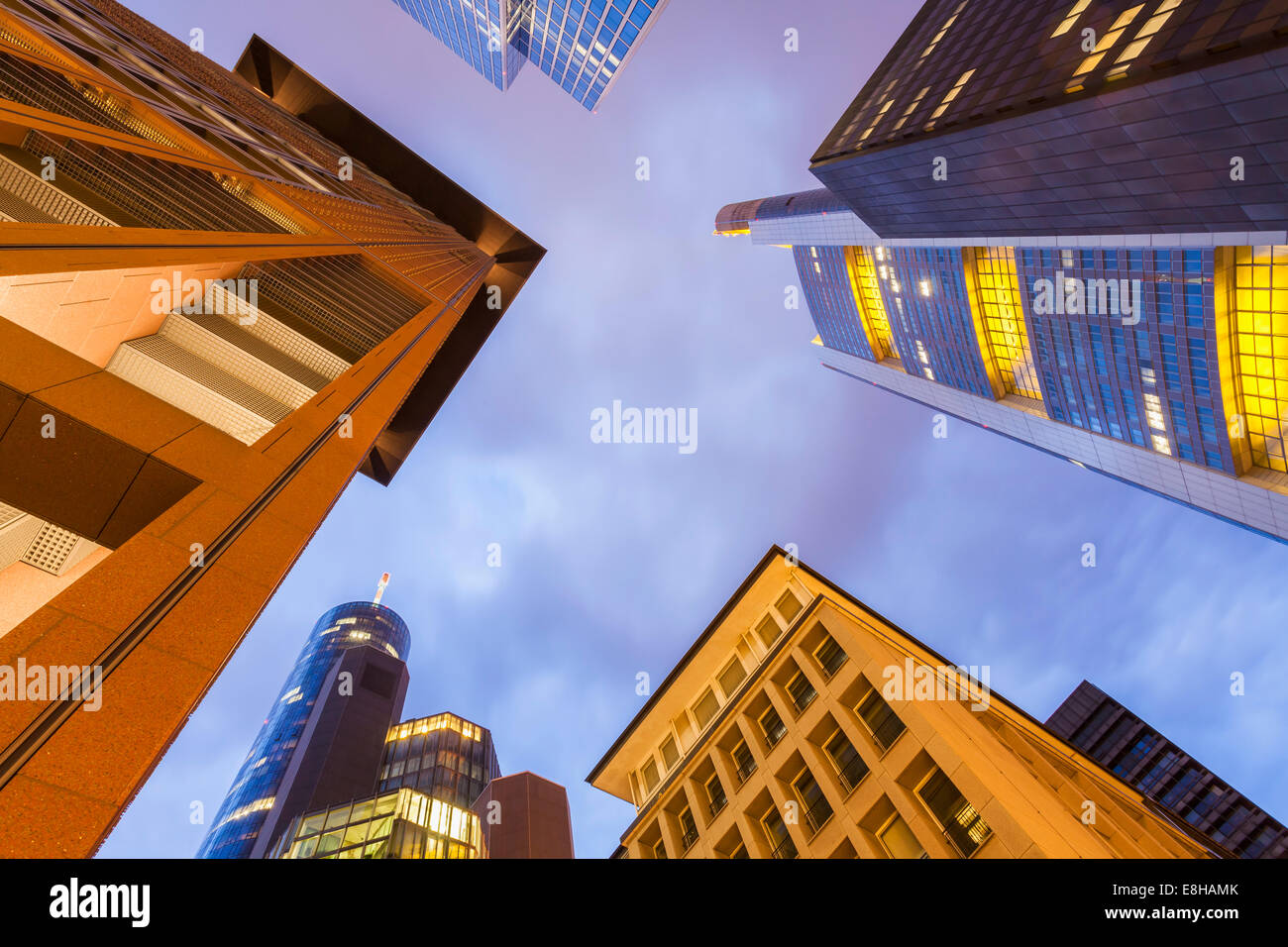 Germany, Hesse, Frankfurt, view to facades of modern office buildings from below at twilight Stock Photo