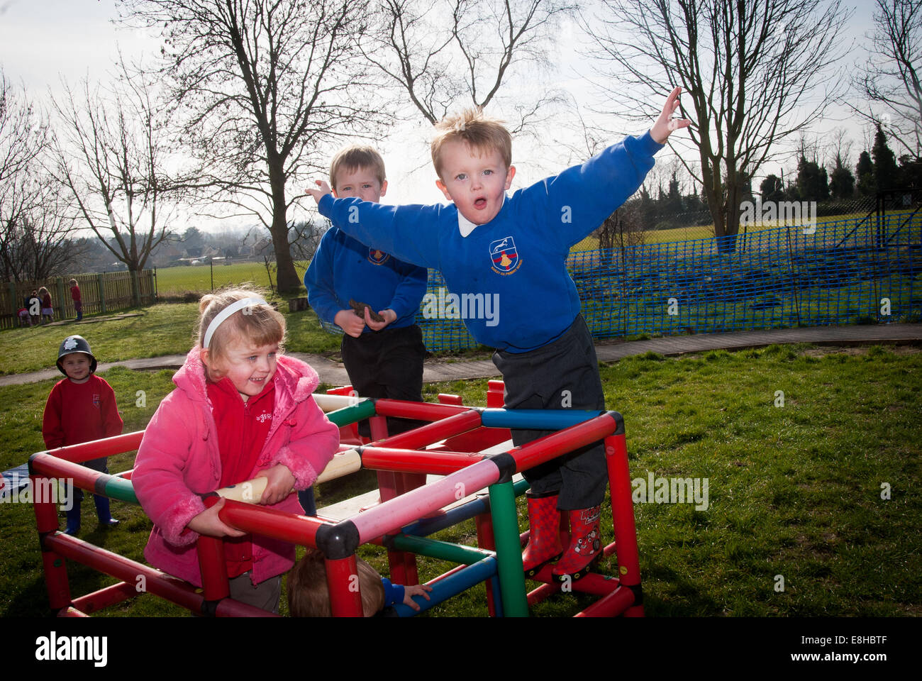 Children playing outside school in playground Stock Photo - Alamy