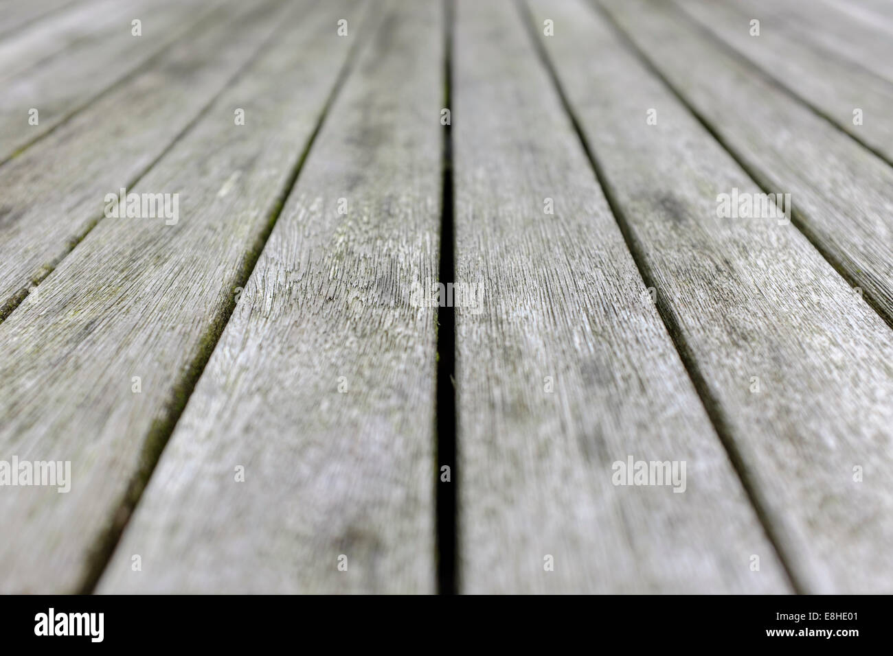 Wooden table close up shallow depth of field Stock Photo - Alamy