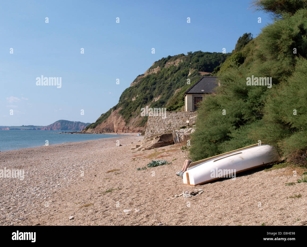 Weston Mouth beach with the former Coastguard building, Sidmouth, Devon