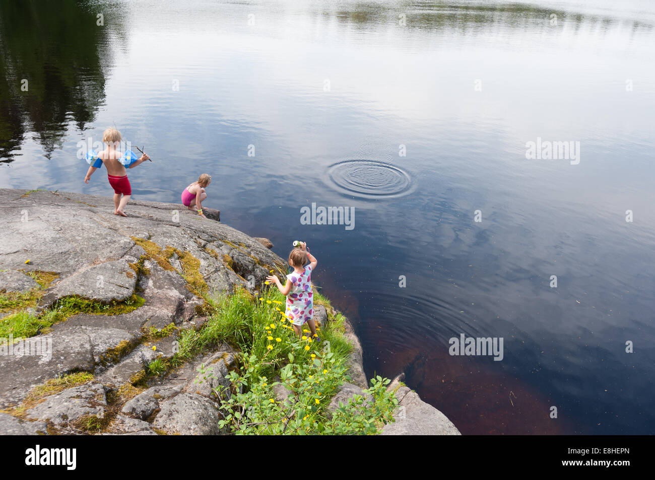 Kids swimming in a small lake, Espoo, Finland Stock Photo Alamy