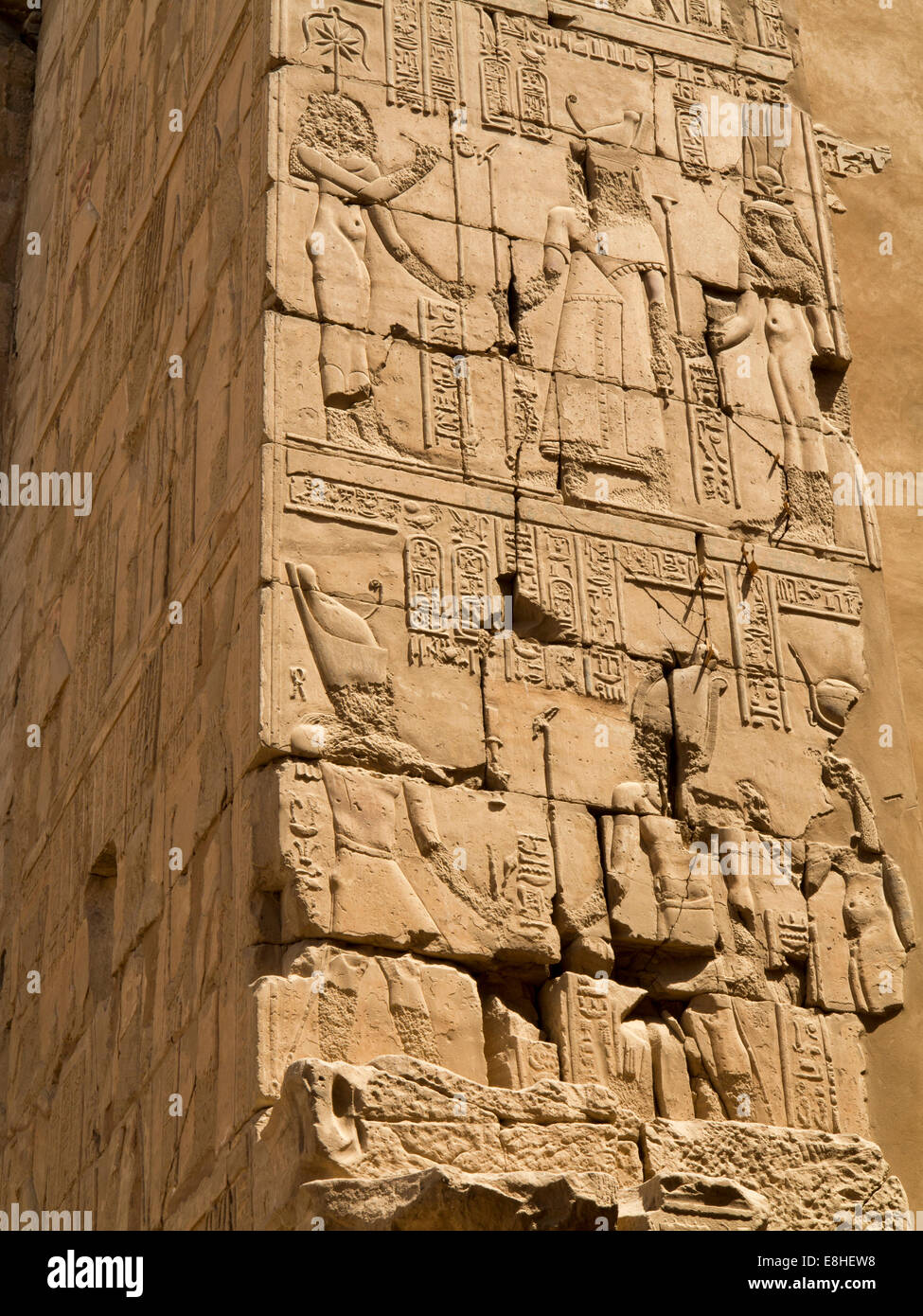 Egypt, Luxor, Karnak Temple, bas relief figures chipped away by later Pharaohs Stock Photo