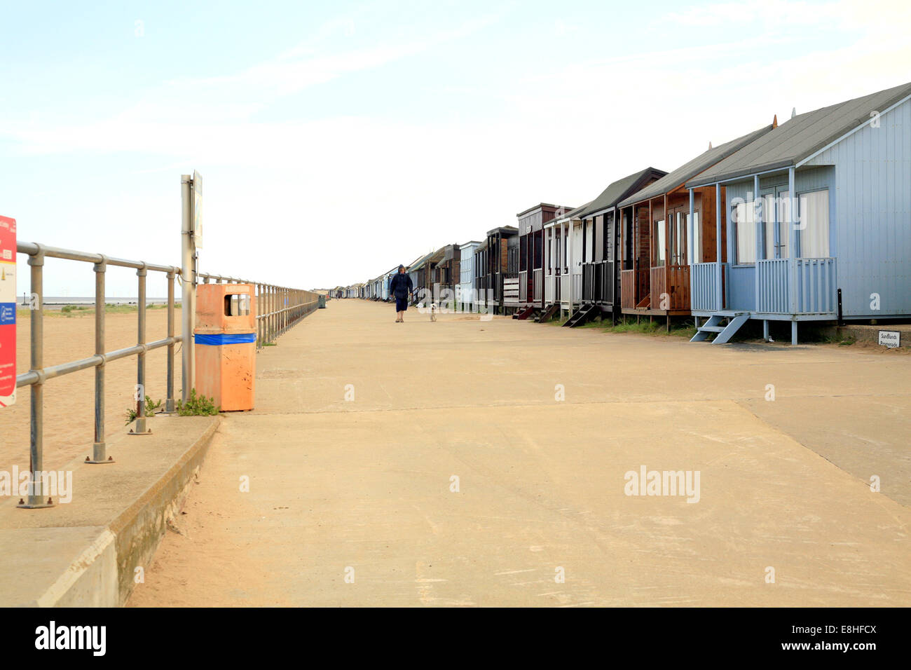 Endless row of beach huts on the promenade at Sandilands near Sutton on