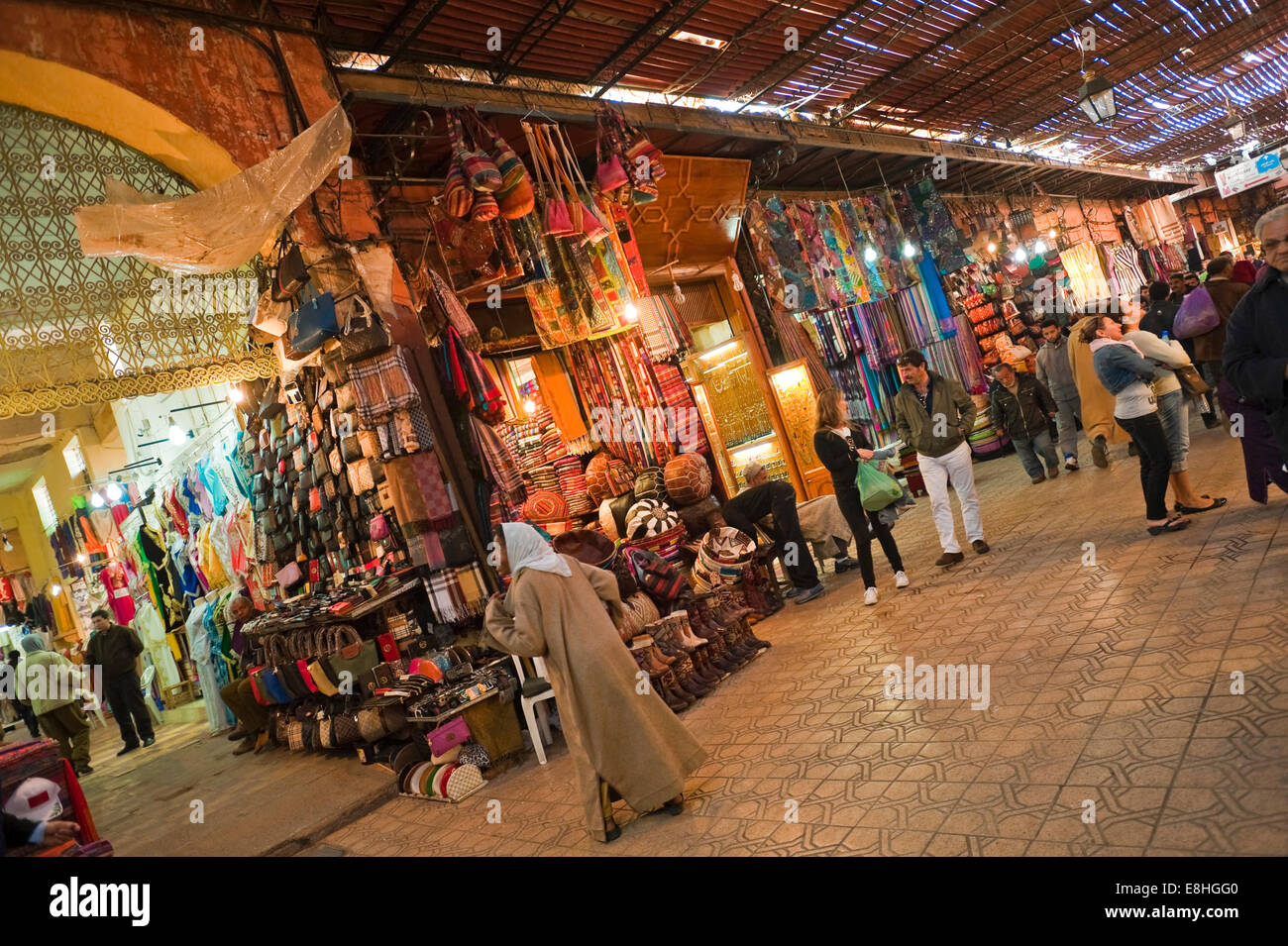 Horizontal view of people walking through the souks of Marrakech. Stock Photo