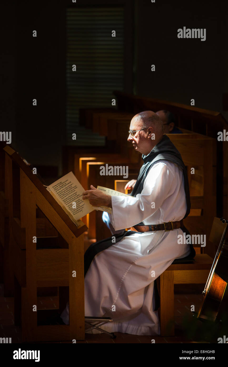 Monk prepares to sing and pray at Mepkin Abbey near Moncks Corner, South Carolina. Stock Photo