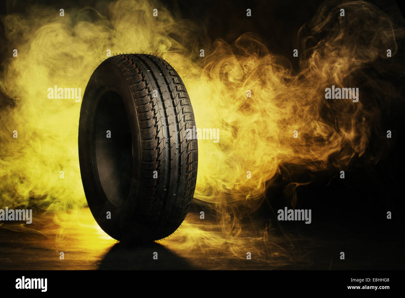 photo of black smoked burning tire Stock Photo Alamy