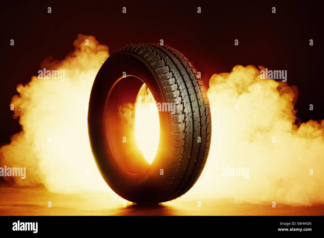 photo of black smoked burning tire Stock Photo Alamy