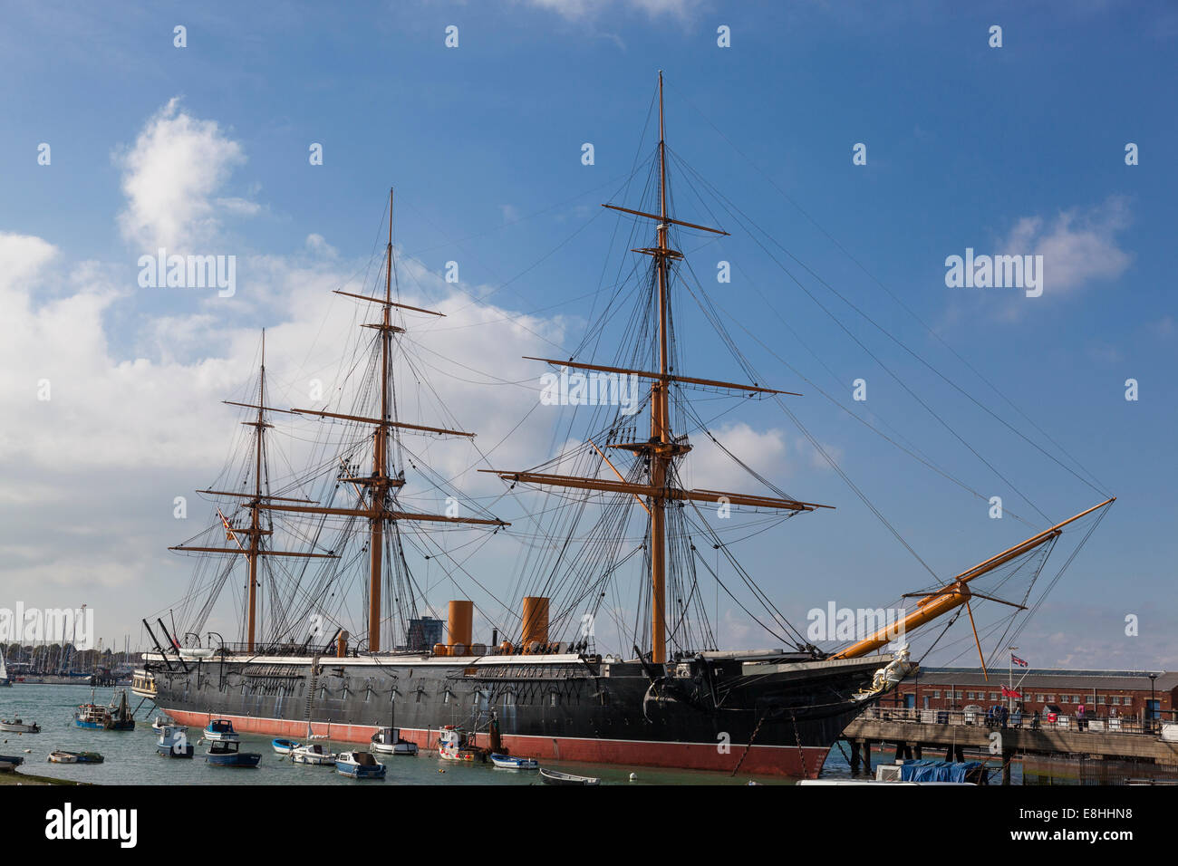 The iron clad HMS Warrior berthed in the Royal Naval Dockyard in Portsmouth, the largest warship when commissioner in 1861. Stock Photo