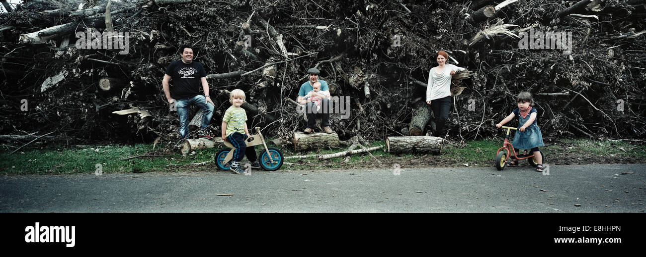 Tree damage after the hurricane ela in Düsseldorf, Germany with a family in the front Stock Photo