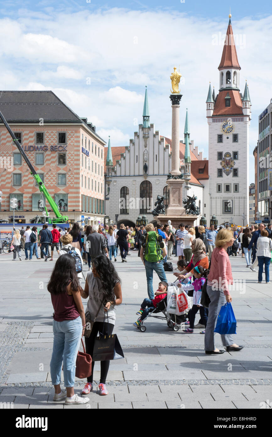 MUNICH, GERMANY - AUGUST 25: Tourists at the Marienplatz in Munich, Germany on August 25, 2014. Stock Photo