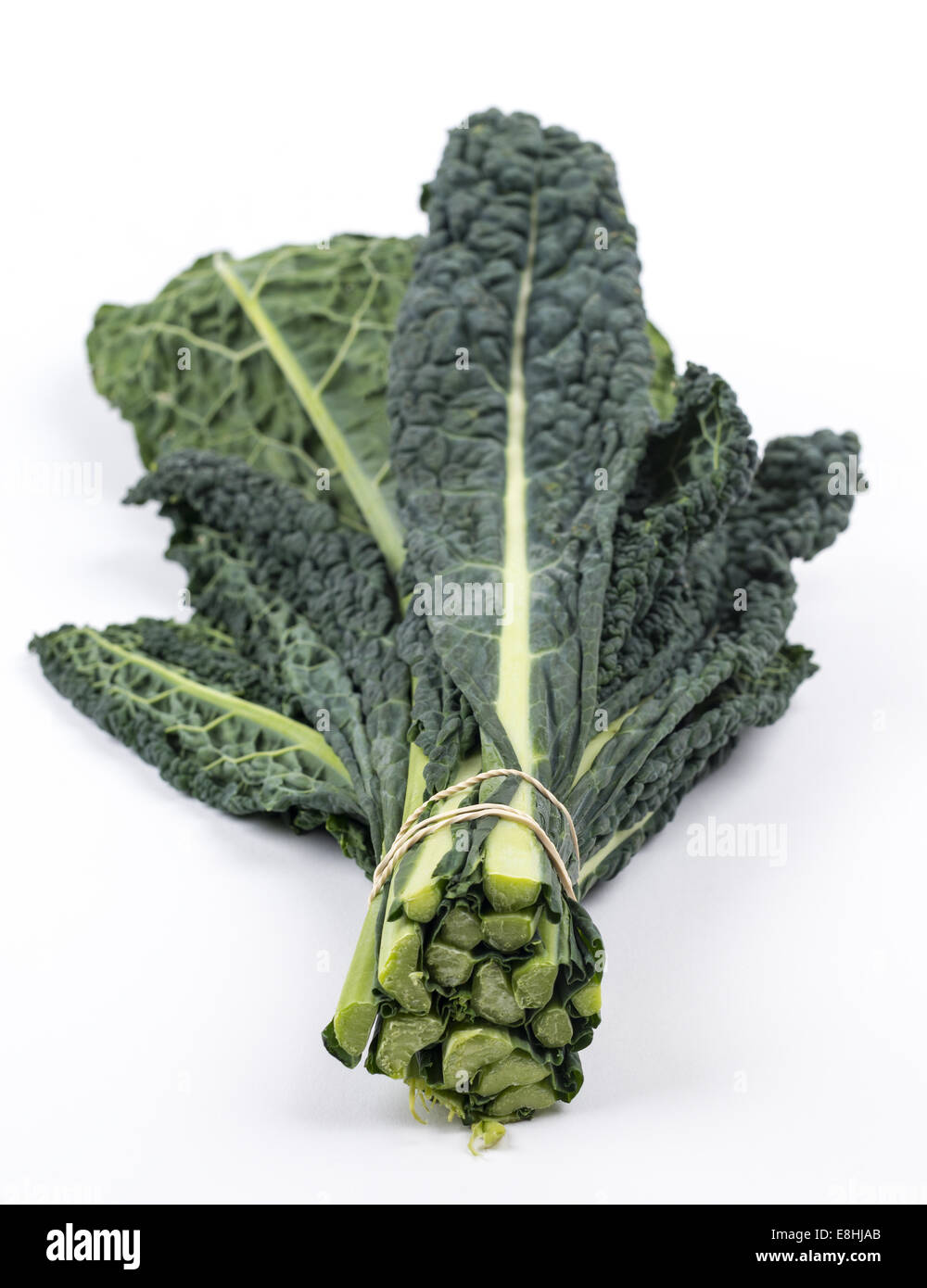 Black kale leaves on white background Stock Photo