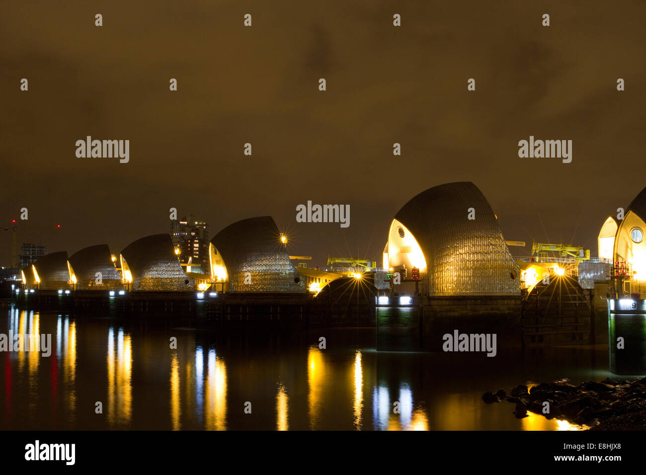 Thames Barrier at night as seen from New Charlton in the Royal Borough of Greenwich. Stock Photo