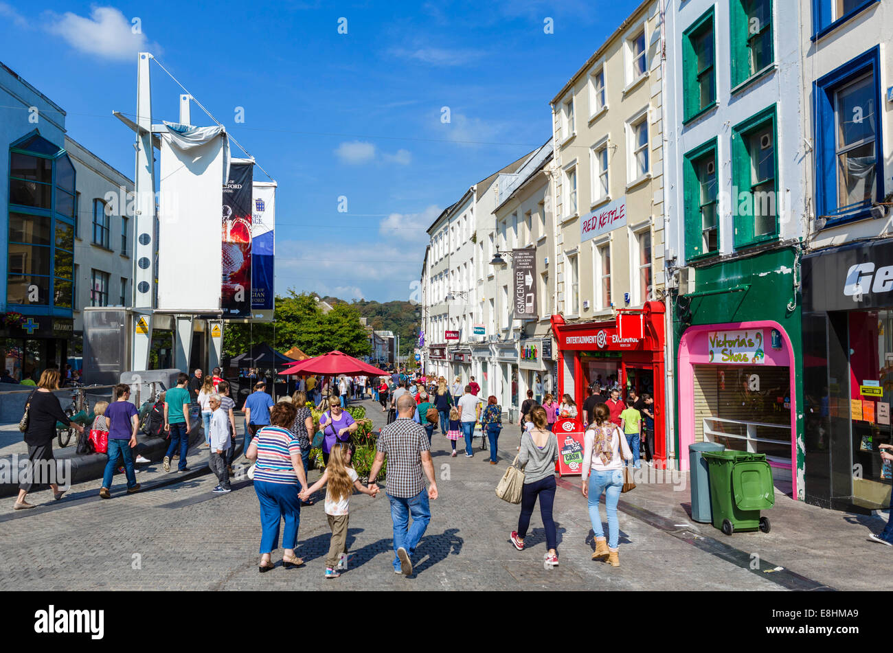 Shops and Broad Street in the city centre, Waterford City, County Waterford,  Republic of Ireland Stock Photo