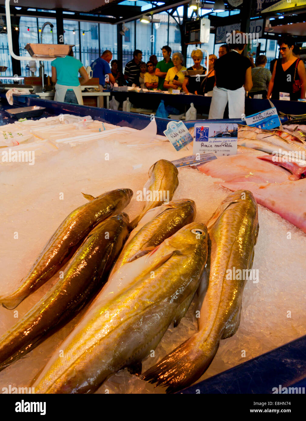 Fresh fish for sale at a fishmongers stall in traditional market in Jonzac in the Charente-Maritime region of south west France Stock Photo