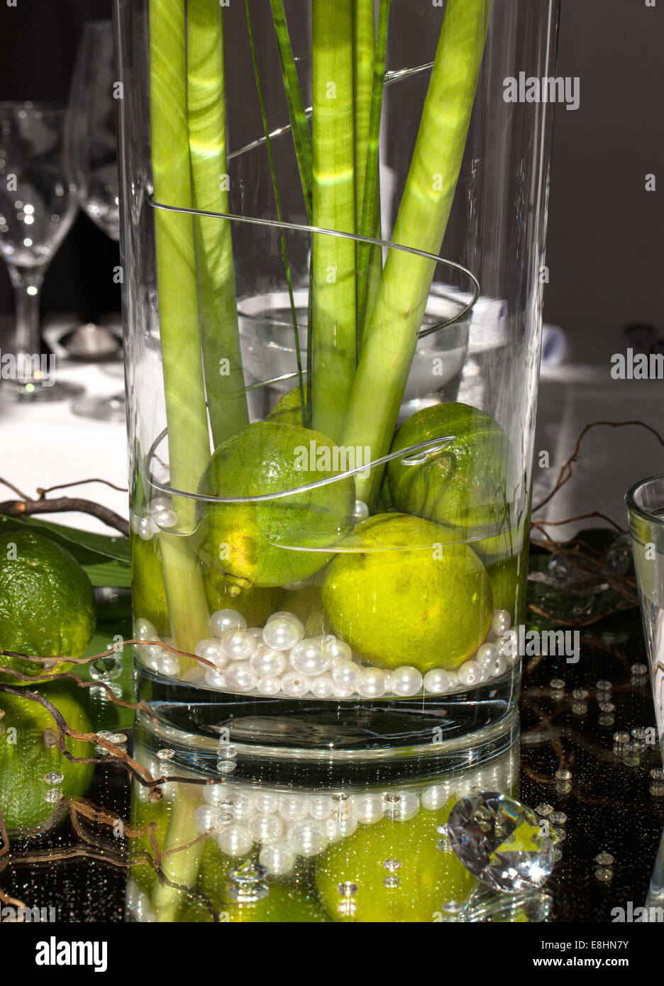 Festive table decoration with limes Stock Photo