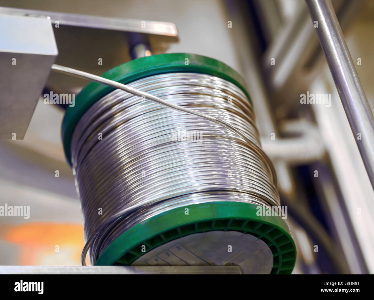 A roller of solder in a holder Stock Photo